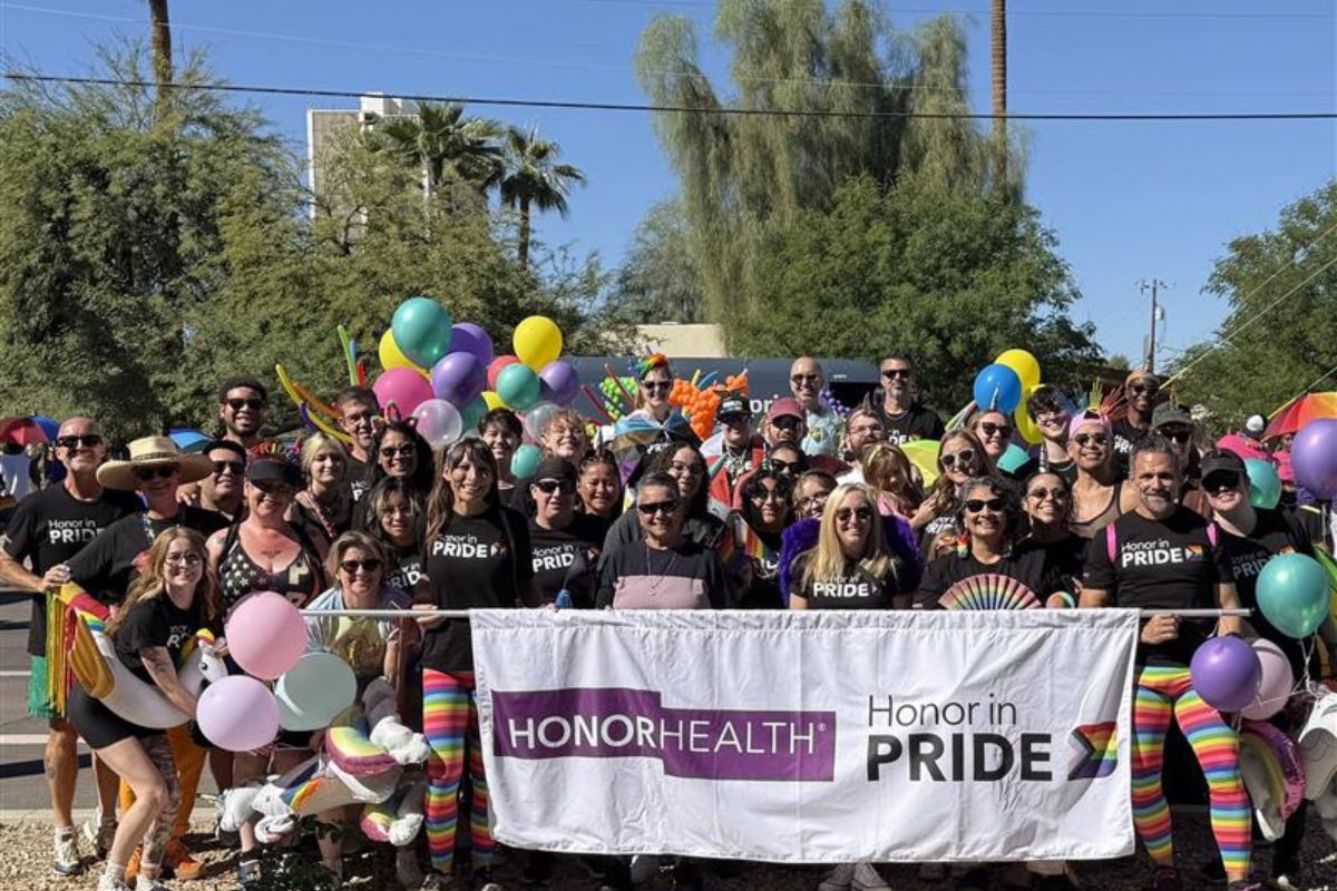 HonorHealth Community and Culture - Employees pose for group photo at an Honor in PRIDE event.