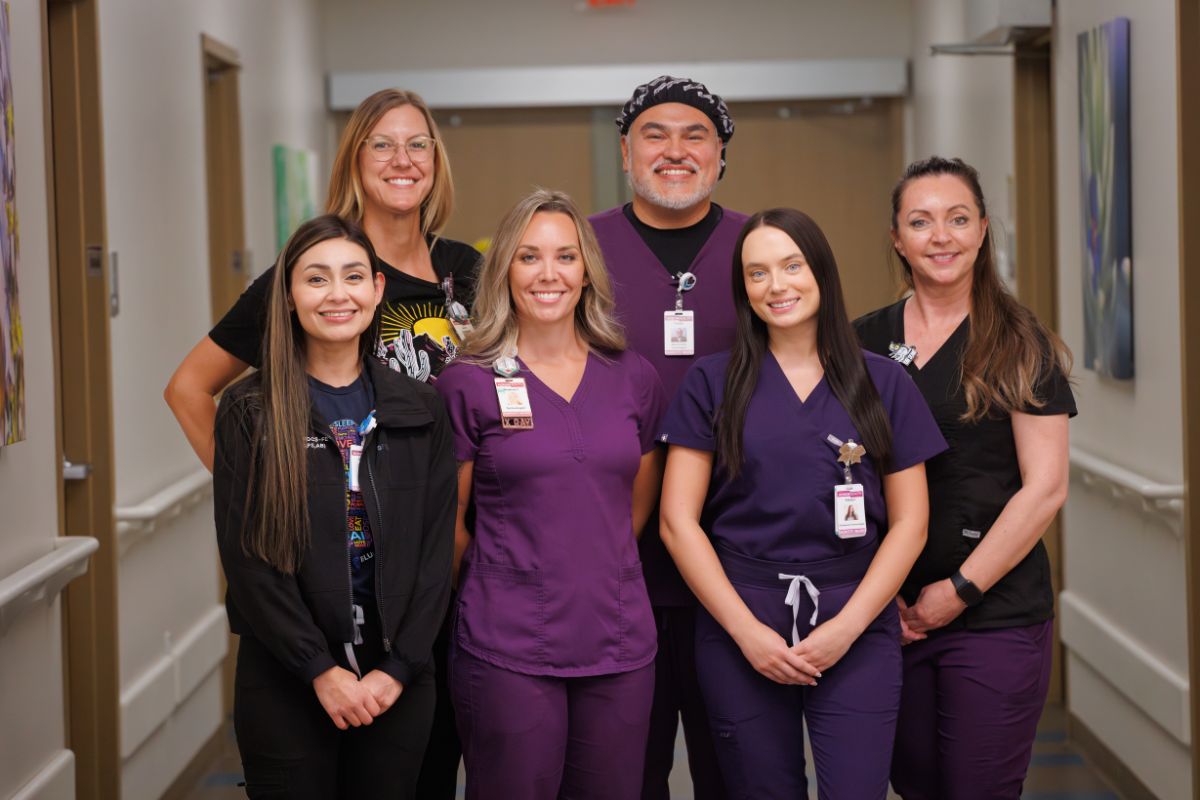HonorHealth Careers - Nurses and physicians smile together for group photo.