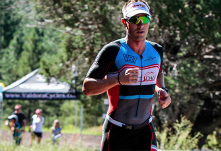 Artificial disk allows dad to resume Ironman competition