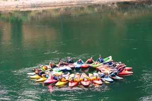 Cancer patient and kayak group