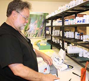 HonorHealth Pharmacy worker shipping an order