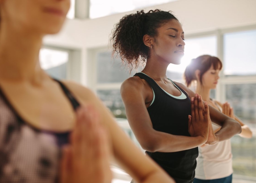 HonorHealth Whole Health Institute - Integrative Medicine members practice yoga to relieve stress and improve health.