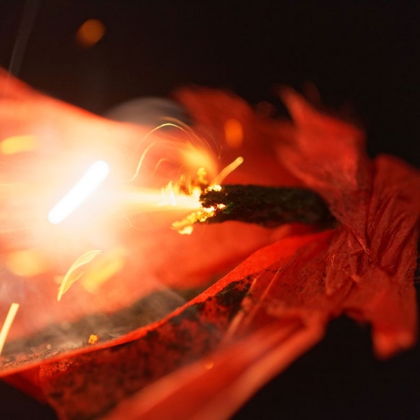 HonorHealth Emergency Services - Firework is being lit on the Fourth of July, which is a common source of injuries.