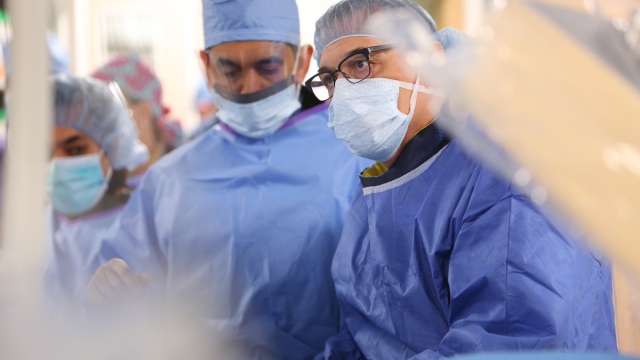 Two HonorHealth doctors perform a procedure 