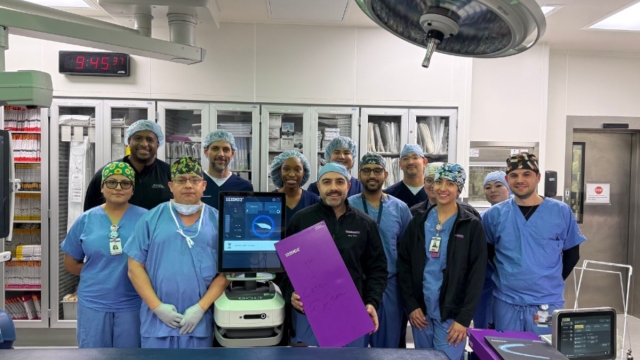 HonorHealth Heart Care - Vascular - Osborn team smiles in operating room after intravascular lithotripsy treatment on PAD patient.