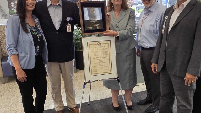 HonorHealth John C. Lincoln Medical Center is presented an award by the American Hospital Association (AHA) for 75 years of advancing healthcare.
