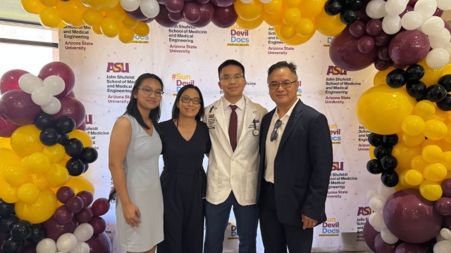 HonorHealth volunteer Dustin Nguyen poses for photo with family while celebrating his admittance to ASU’s John Shufeldt School of Medicine and Medical Engineering at age 19.